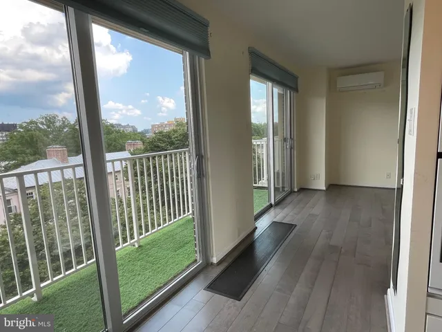 a view of room with floor to ceiling window