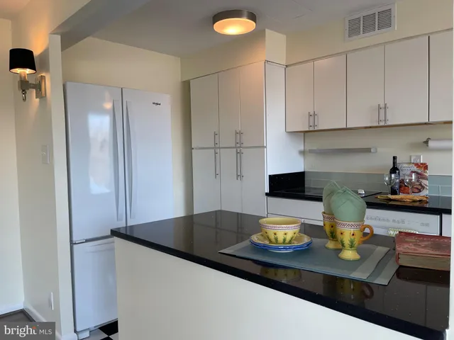 a view of a lake with a city