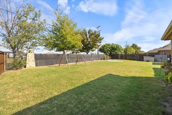 a view of an outdoor space and a yard