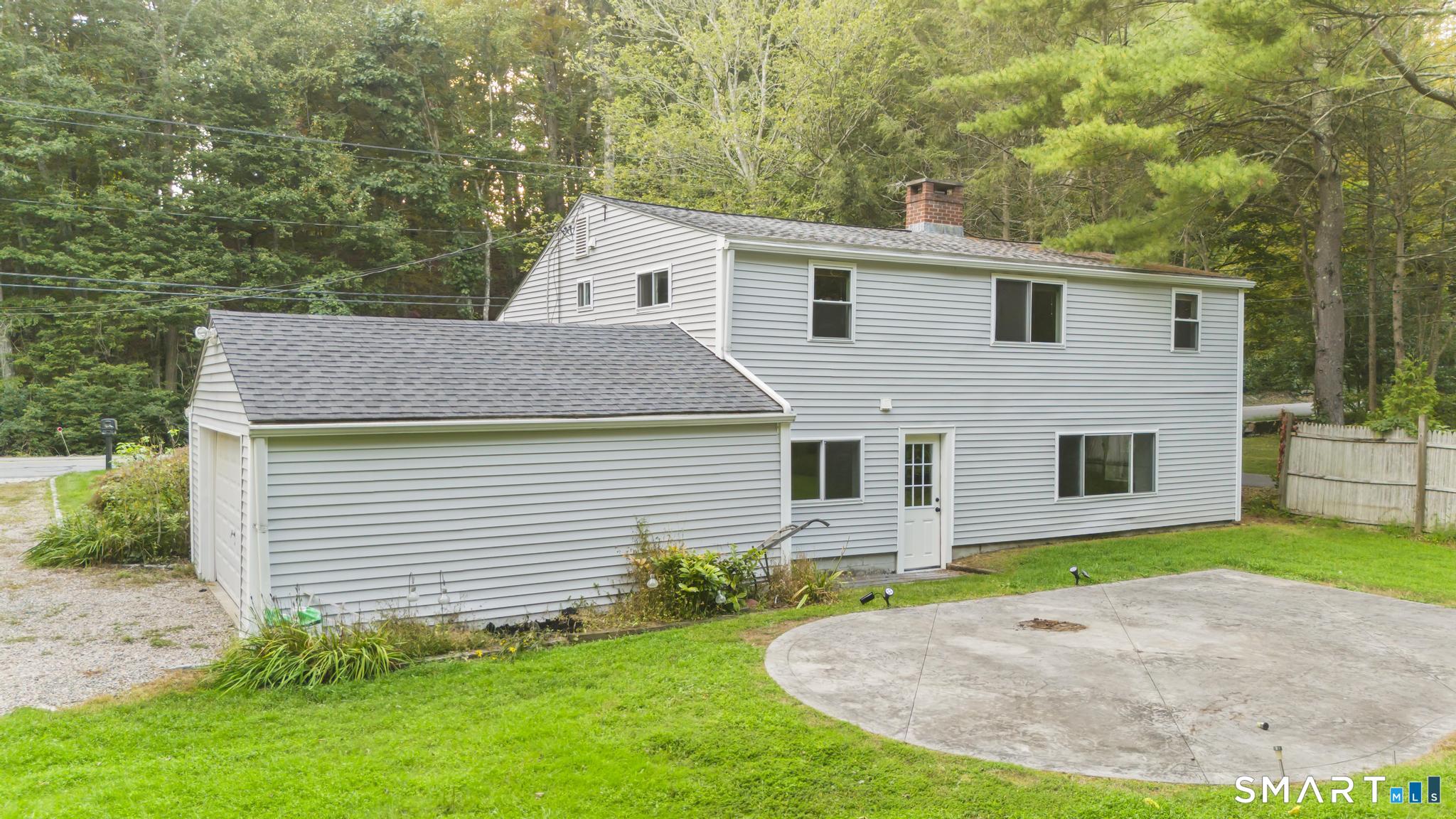 89 Book Hill Road Essex, CT 06426 - Photo 3 of 40 a view of a house with a yard