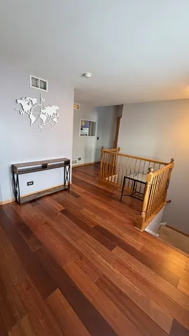 a living room with furniture window and a fireplace