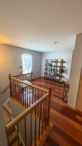 a living room with furniture window and a fireplace
