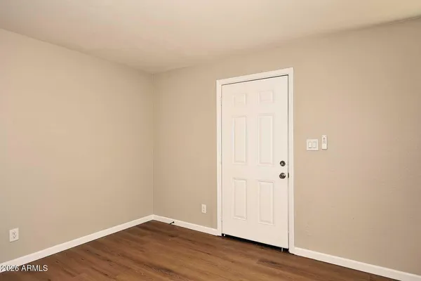 a view of small space with wooden floor
