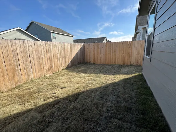 a view of wooden fence