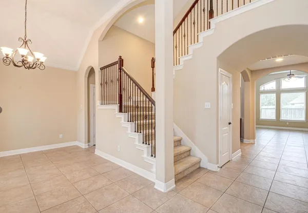 a view of entryway and hall with a window
