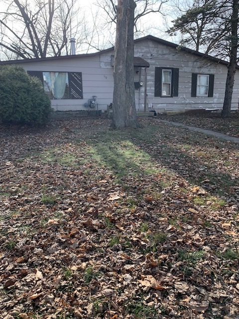 117 Clark Street Chenoa, IL 61726 - Photo 1 of 9 a view of a house with a yard