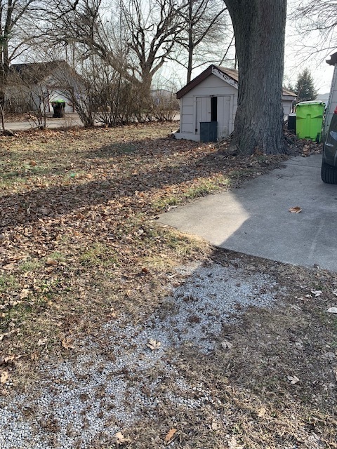 117 Clark Street Chenoa, IL 61726 - Photo 2 of 9 a view of a house with a yard