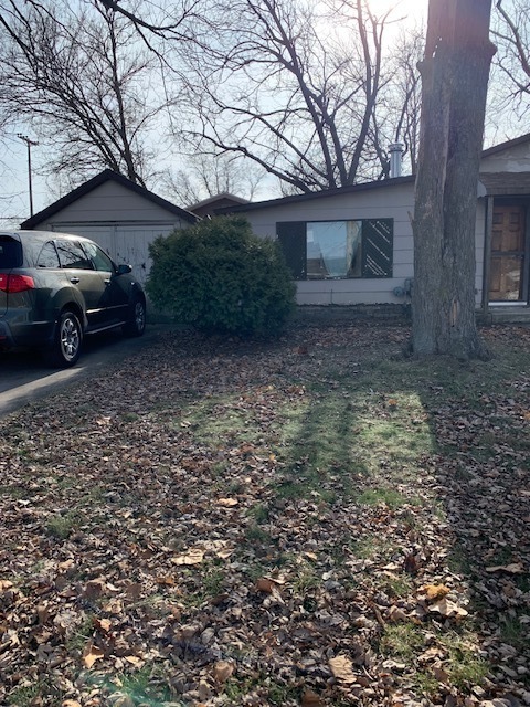 117 Clark Street Chenoa, IL 61726 - Photo 3 of 9 a view of a house with a back yard