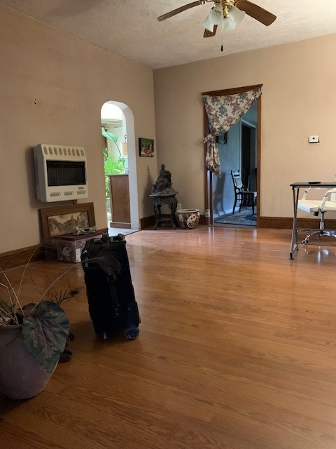 117 Clark Street Chenoa, IL 61726 - Photo 6 of 9 a living room with furniture and a flat screen tv