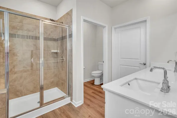 a bathroom with a sink and a shower