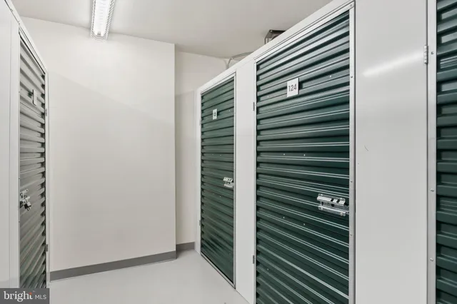 a view of bathroom with a shower and a sink