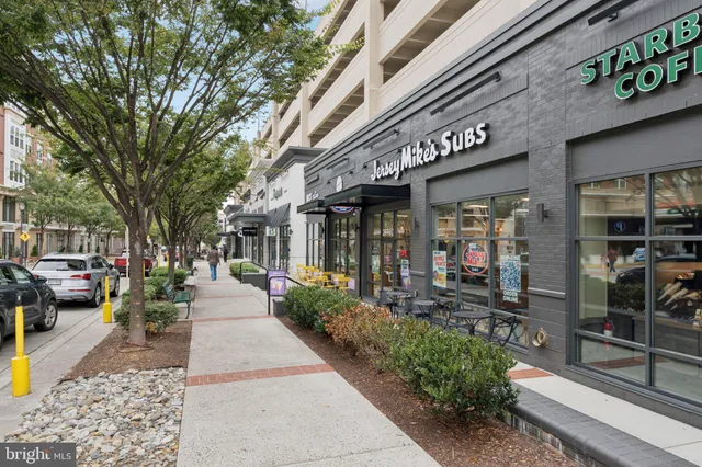 a view of a building with sitting area