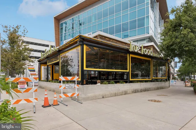 a view of a building with sitting area