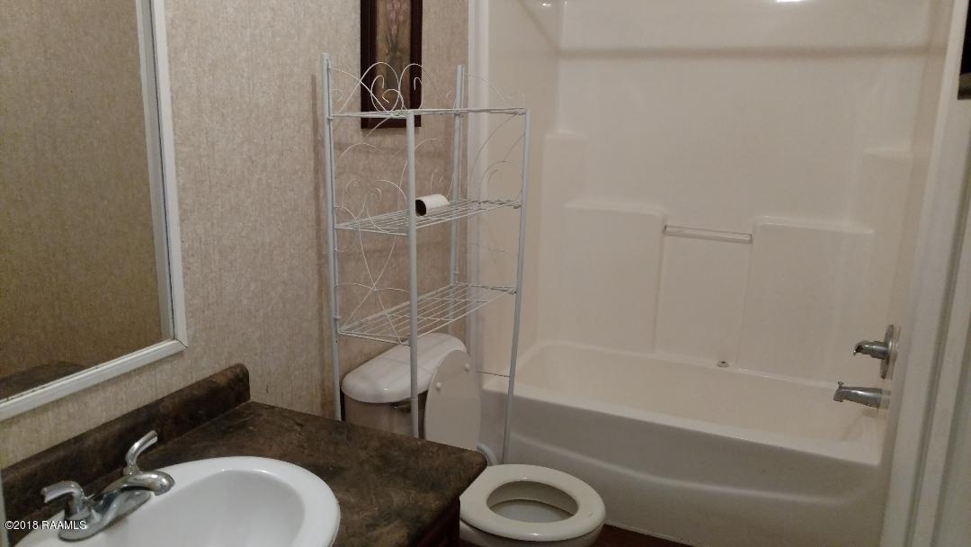 1056 Ragan Road Breaux Bridge, LA 70517 - Photo 6 of 9 hall bath