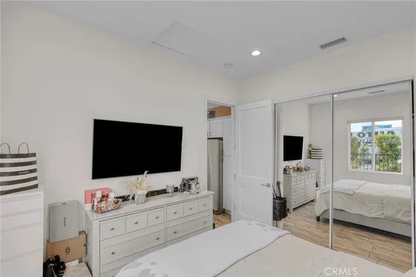 a room with furniture and flat screen tv