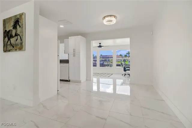 a view of kitchen and windows