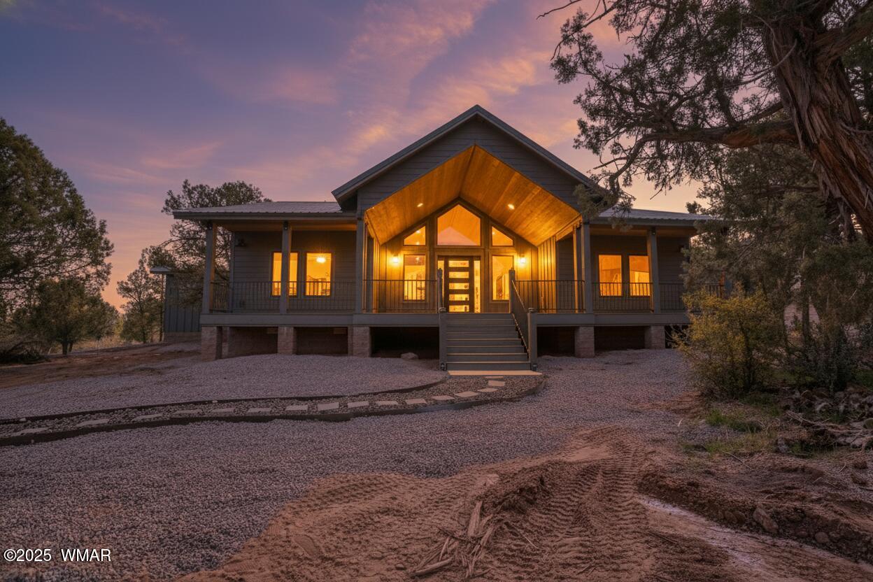 957 Cheney Ranch Loop Show Low, AZ 85901 - Photo 2 of 33 Front of house, that faces mostly west, a little north....