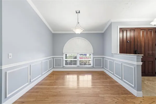 a view of a hallway with an entryway