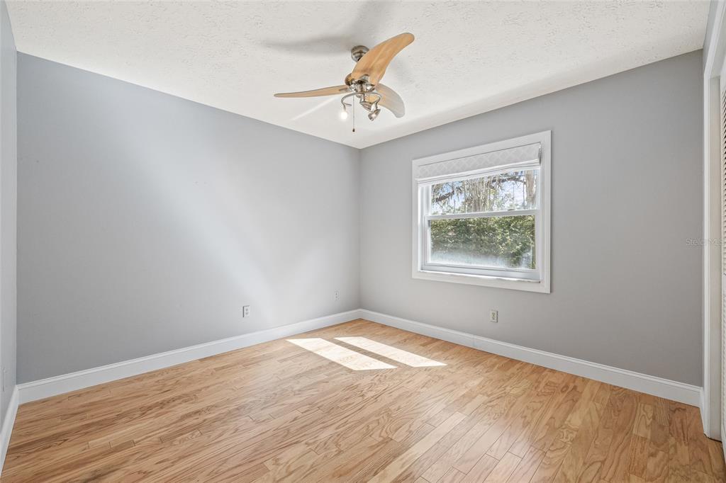 603 Cottage Grove Circle Valrico, FL 33594 - Photo 46 of 60 a view of an empty room with a window
