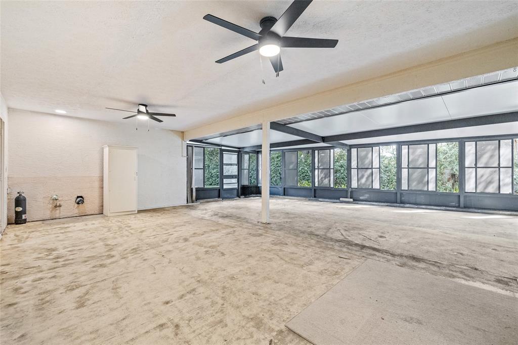 603 Cottage Grove Circle Valrico, FL 33594 - Photo 49 of 60 a view of an empty room with a window
