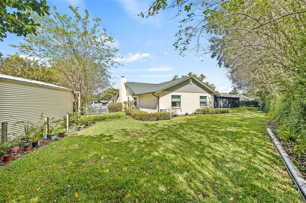 603 Cottage Grove Circle Valrico, FL 33594 - Photo 54 of 60 a house view with a outdoor space