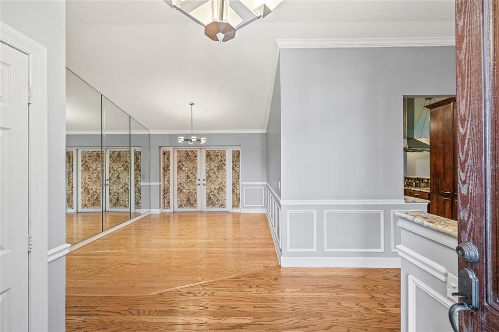 603 Cottage Grove Circle Valrico, FL 33594 - Photo 8 of 60 a view of an empty room with a window