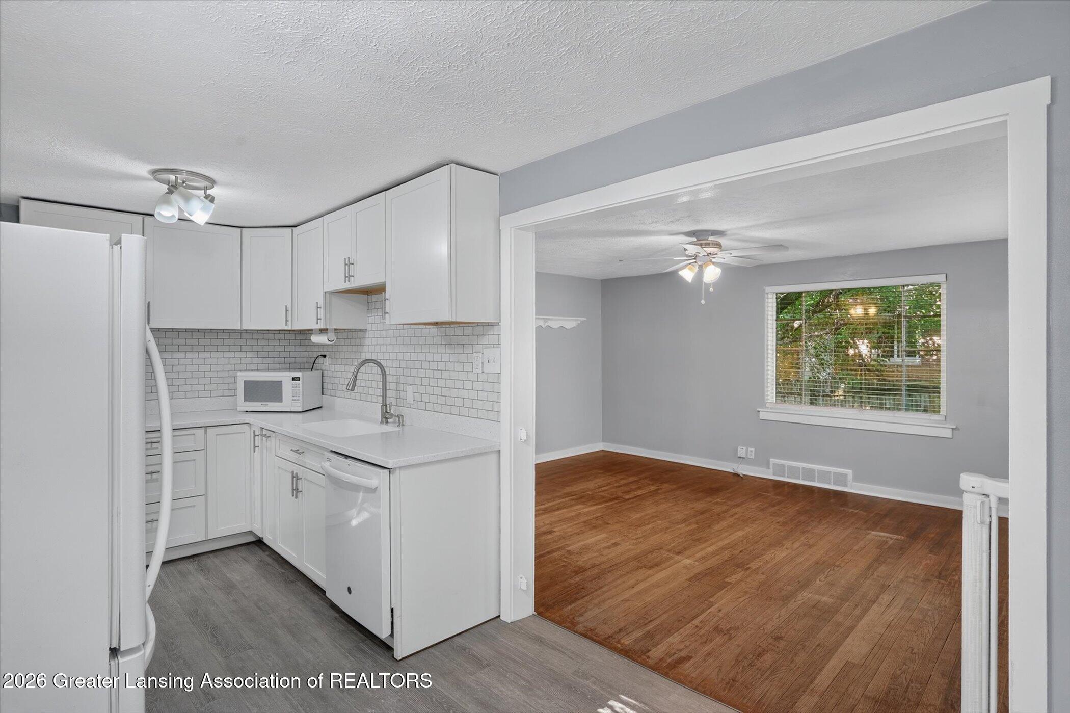 2020 Hamilton Road Okemos, MI 48864 - Photo 7 of 38 08-2020-Hamilton-Rd-WindowStill-Photogra