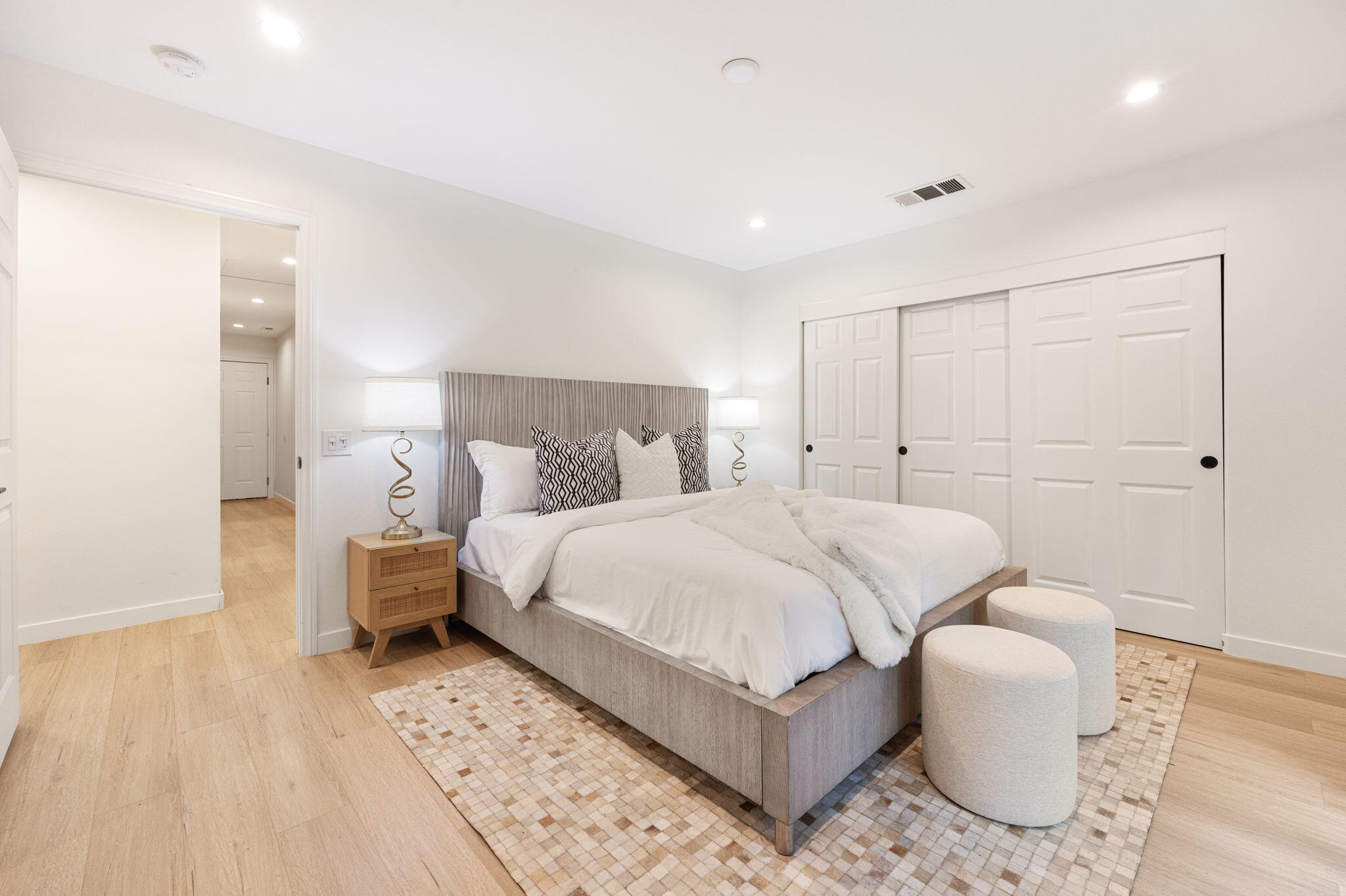 2900 North Cypress Road Palm Springs, CA 92262 - Photo 19 of 48 a bedroom with a white bed and white walls