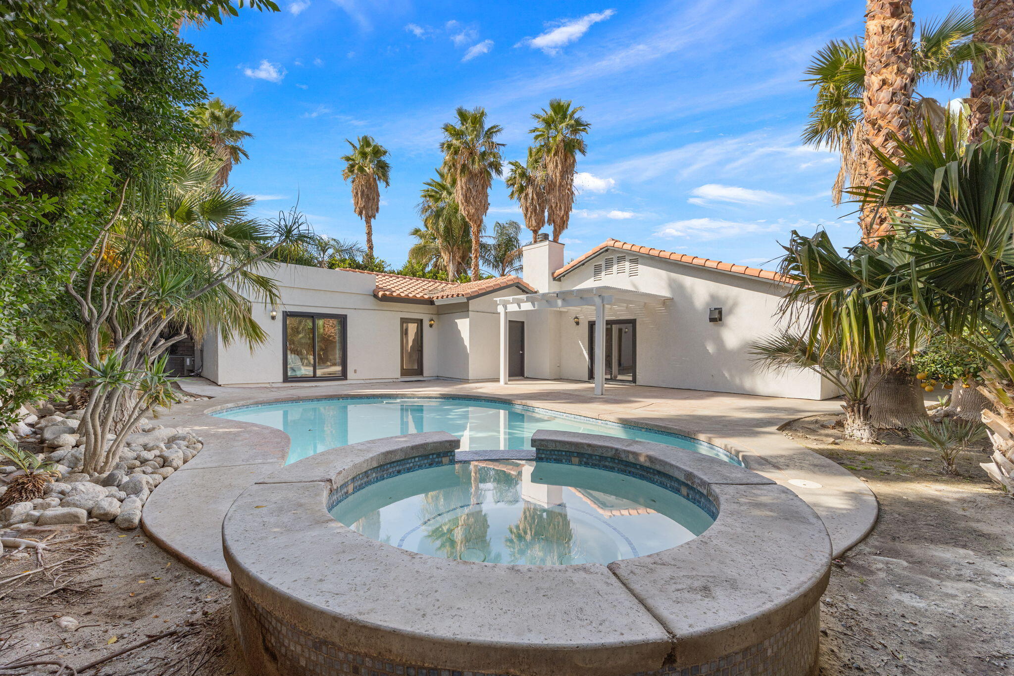 2900 North Cypress Road Palm Springs, CA 92262 - Photo 38 of 48 a view of house with swimming pool and a sitting space