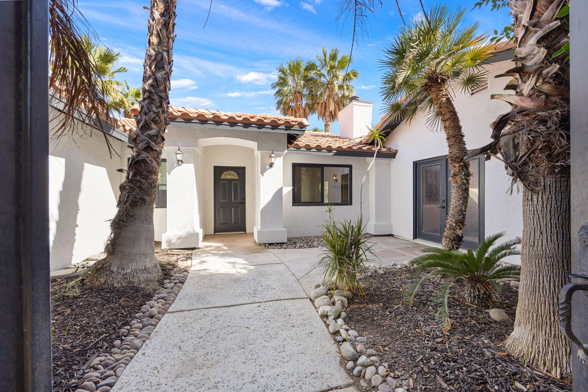 2900 North Cypress Road Palm Springs, CA 92262 - Photo 5 of 48 a front view of a house with a yard