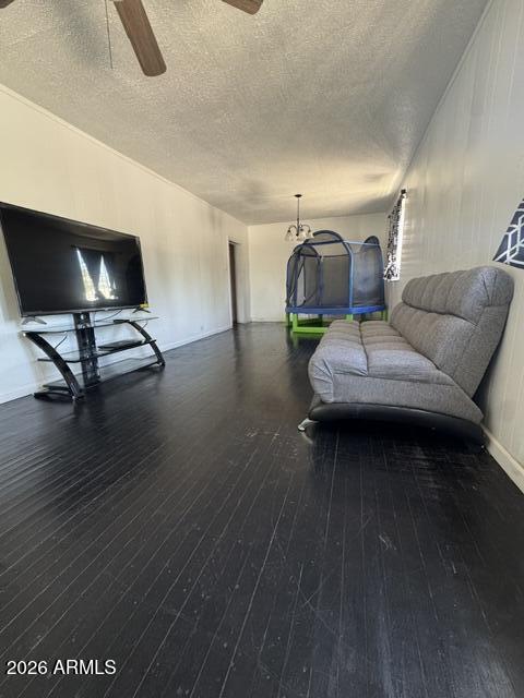 701 6th Green Street Douglas, AZ 85607 - Photo 2 of 10 a living room with furniture and a wooden floor
