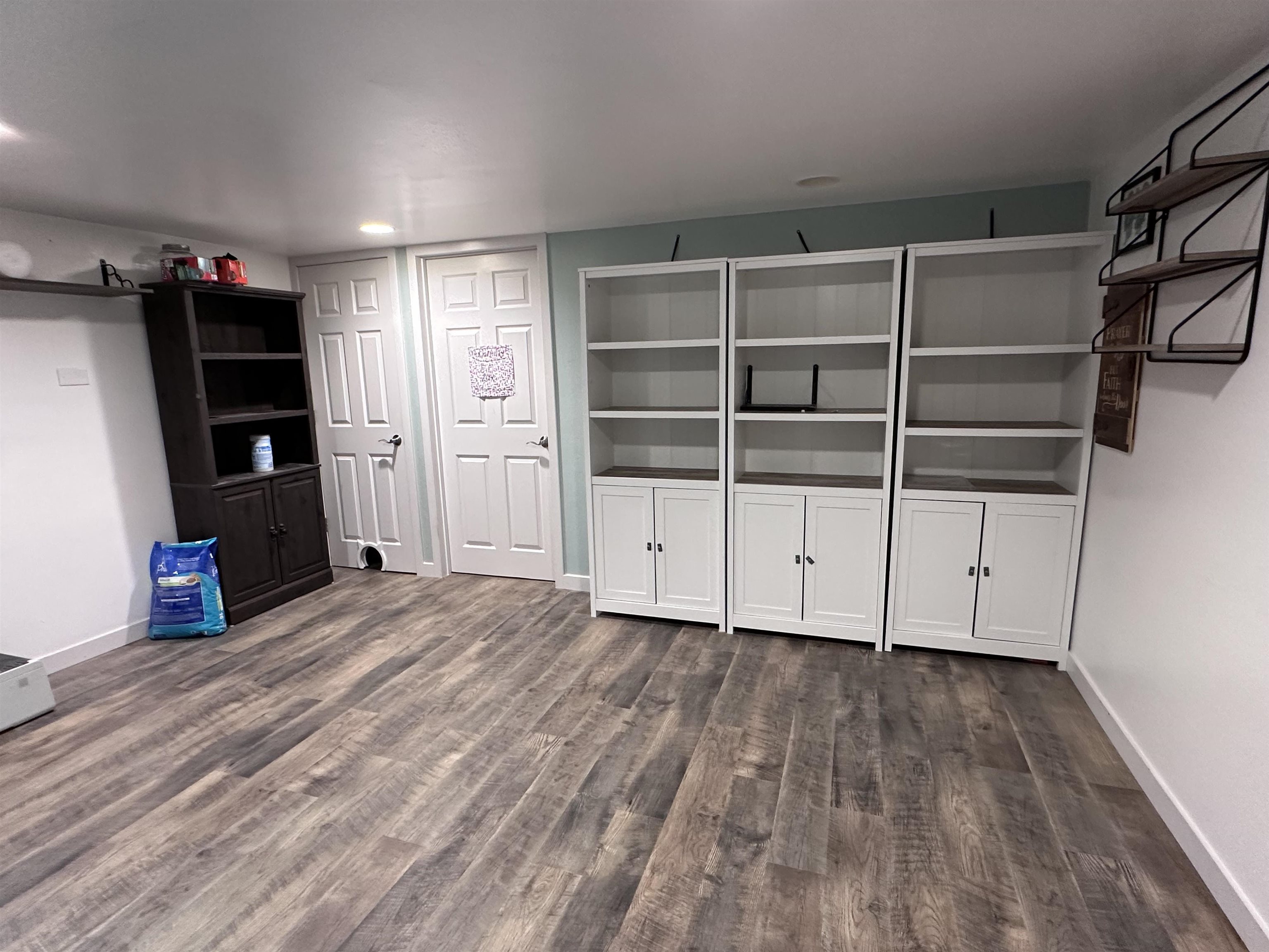 9456 6075th Road Montrose, CO 81403 - Photo 27 of 36 a view of empty room with wooden floor and closet