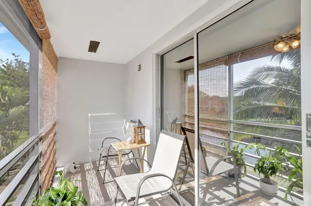 a view of an outdoor dining space with furniture