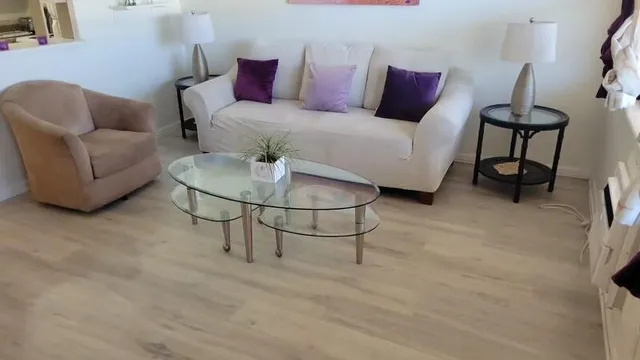 a view of a workspace with furniture