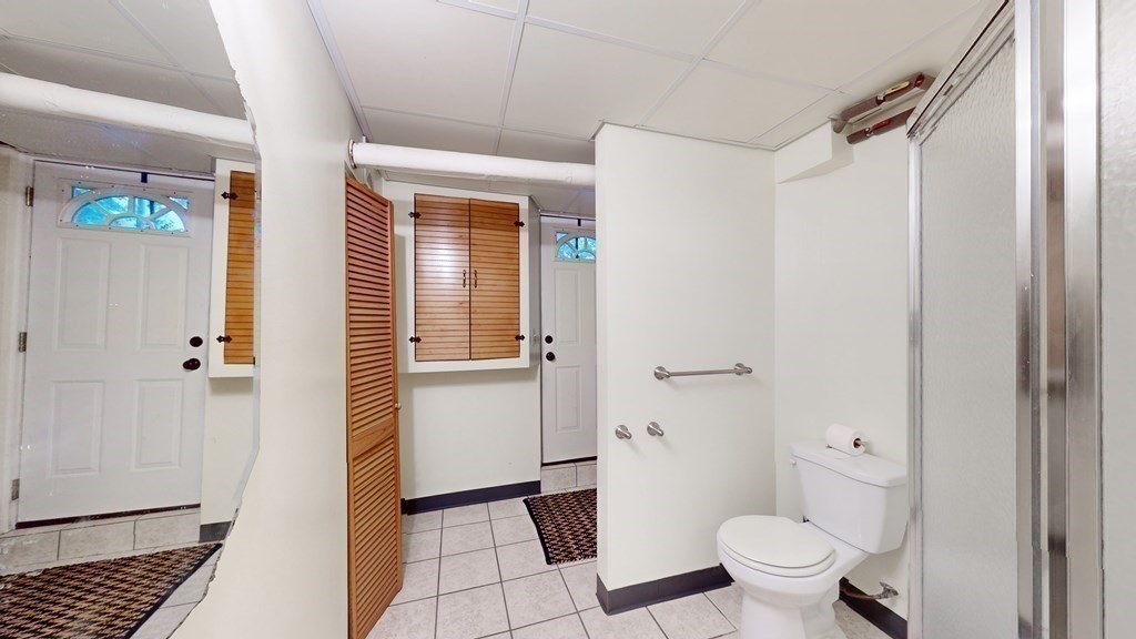 569 Mill Street Worcester, MA 01602 - Photo 16 of 24 a bathroom with a sink toilet and shower