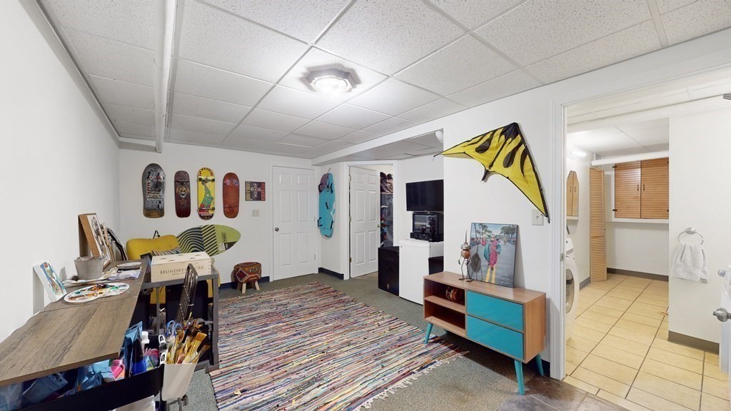 569 Mill Street Worcester, MA 01602 - Photo 21 of 24 a bed room with furniture and wooden floor