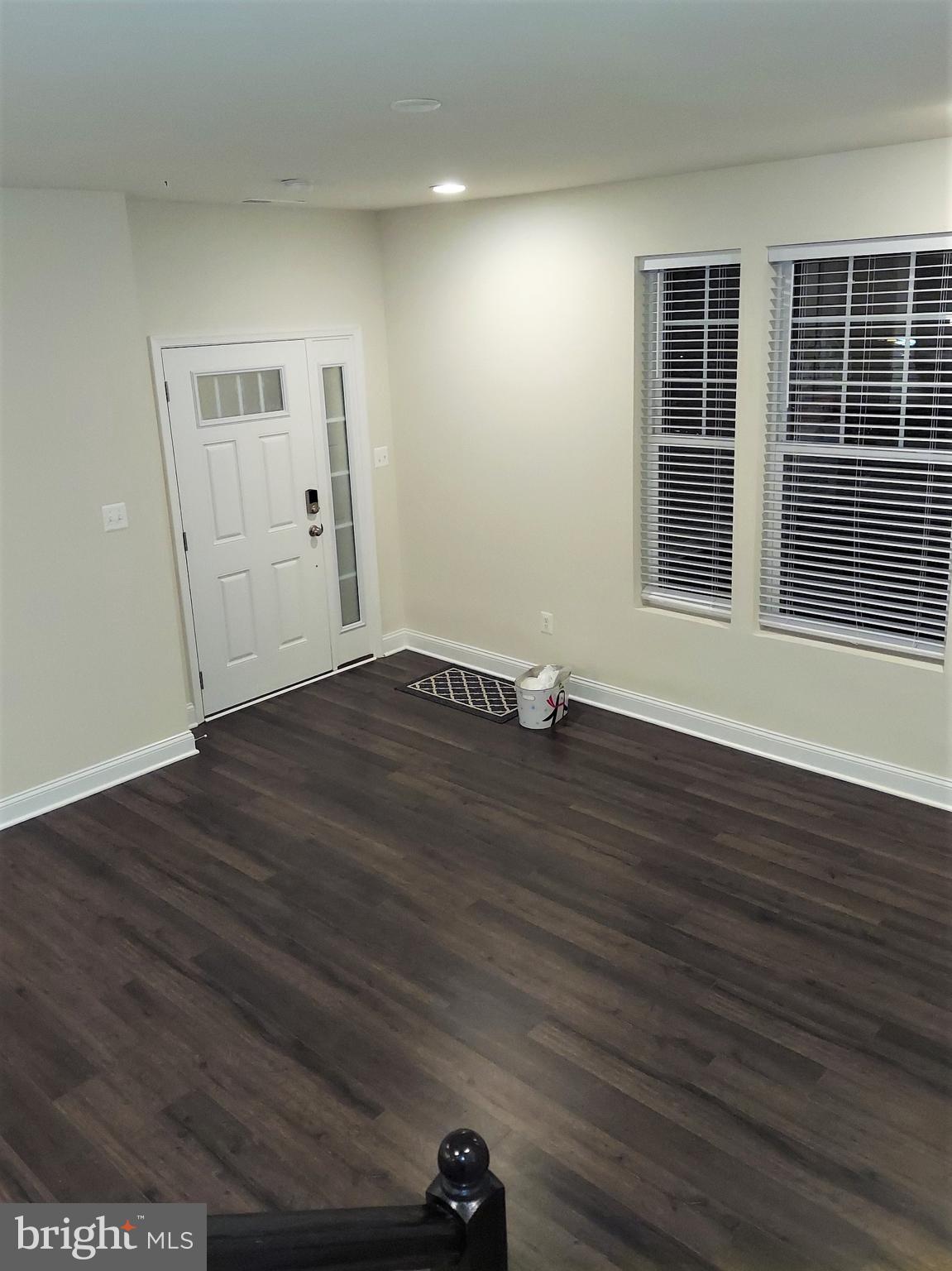 7140 Proclamation Place Frederick, MD 21703 - Photo 14 of 29 Front entry and living room, lots of natural light