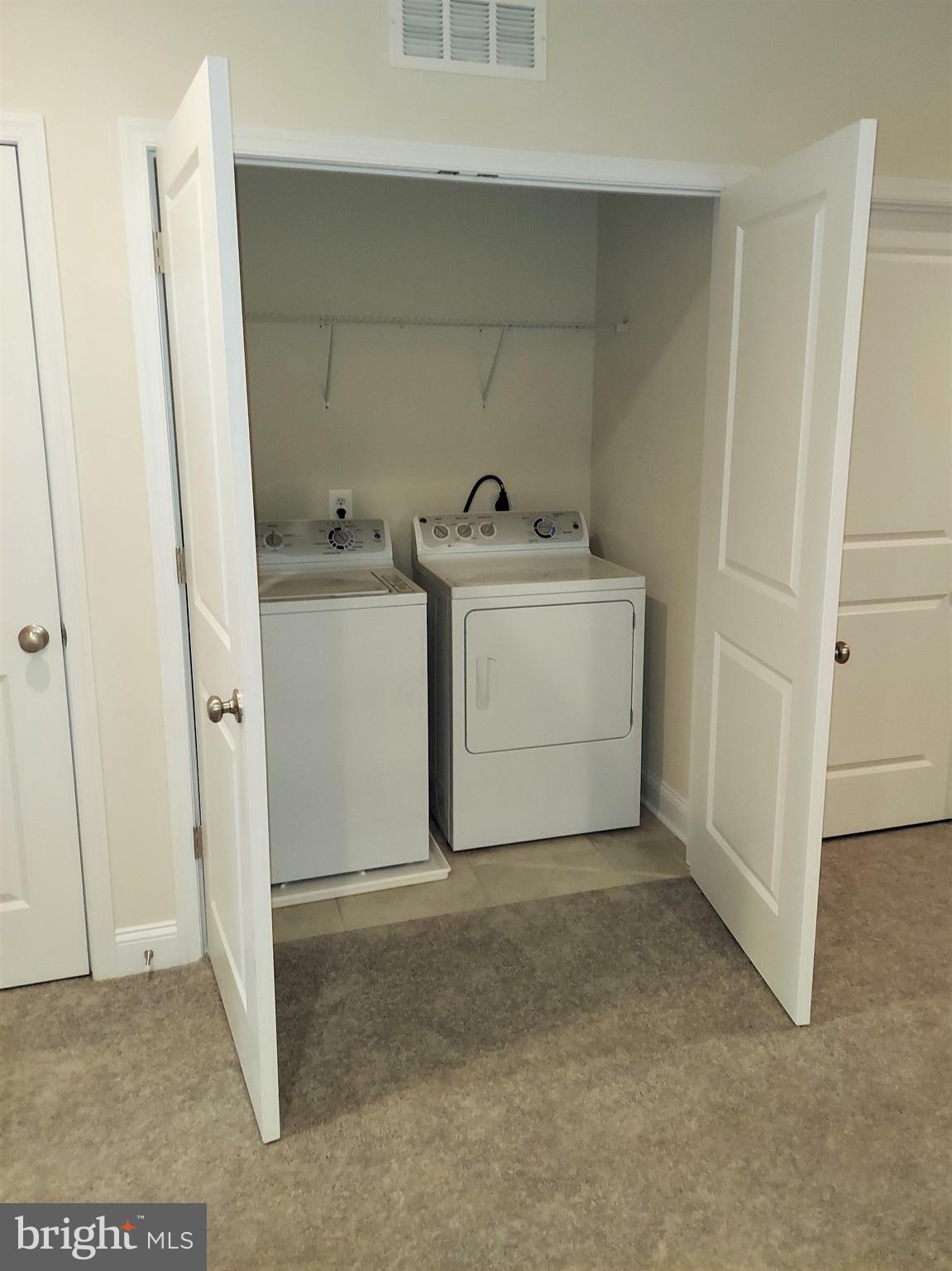 7140 Proclamation Place Frederick, MD 21703 - Photo 22 of 29 Laundry opens to loft, washer & dryer included