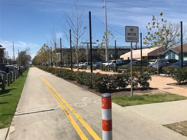 a view of house with outdoor space and sitting area