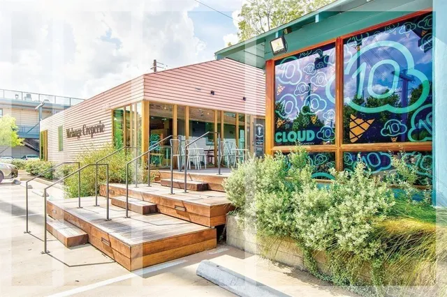 a view of a chairs and table in the patio