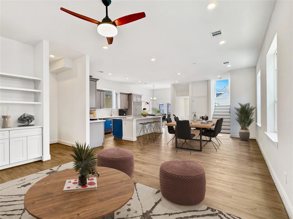 1221 West 16th Street, Unit B Houston, TX 77008 - Photo 3 of 13 a living room with furniture kitchen view and a potted plant