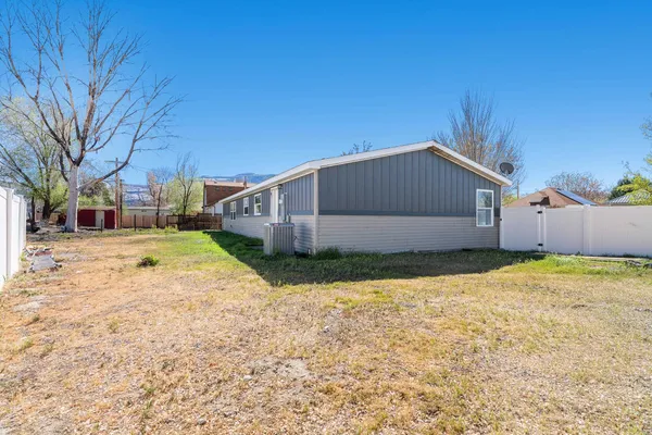 a house view with a backyard space