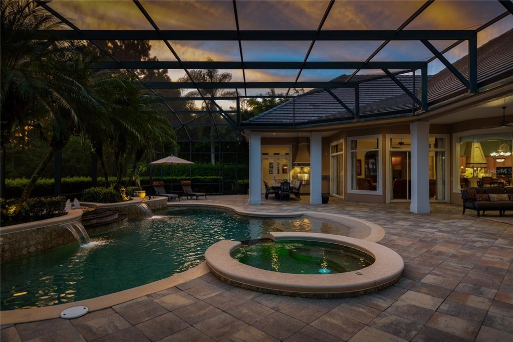 2016 Castelli Boulevard Mount Dora, FL 32757 - Photo 33 of 52 a view of a patio with a table and chairs under an umbrella