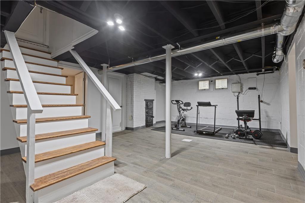 1355 Washington Road Pittsburgh, PA 15228 - Photo 33 of 49 The downstairs game room is huge with two additional storage rooms.