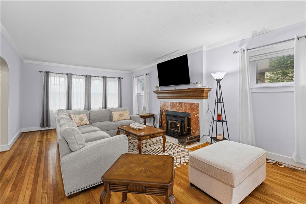 1355 Washington Road Pittsburgh, PA 15228 - Photo 8 of 49 Wood-burning fireplace with an insert.