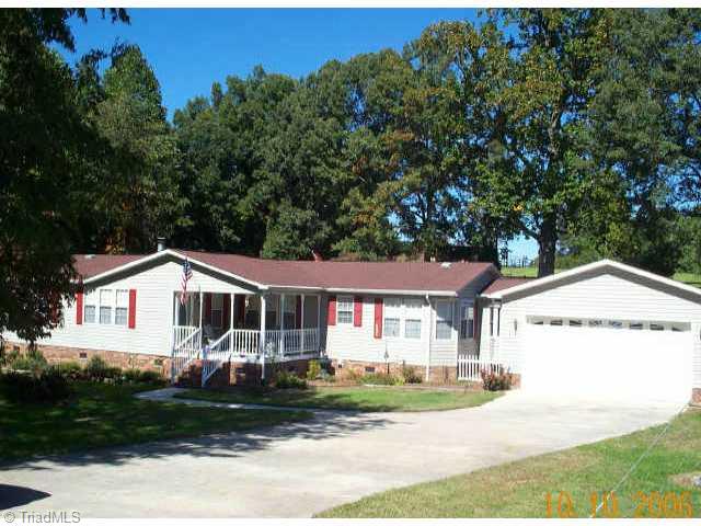 1500 Becky Hill Road Lexington, NC 27295 - Photo 1 of 8 Exterior Front. Large front yard, paved drive, and attached 2 car garage with plenty of storage area.