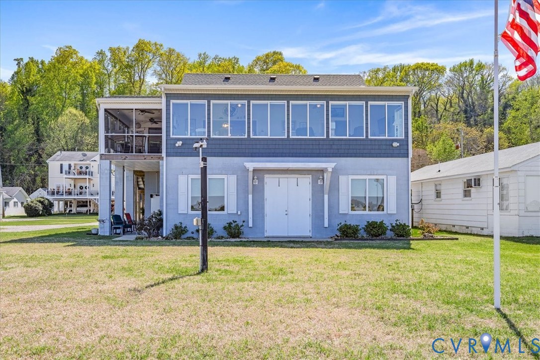 683 Villa Road Claremont, VA 23881 - Photo 2 of 28 a house view with a garden space