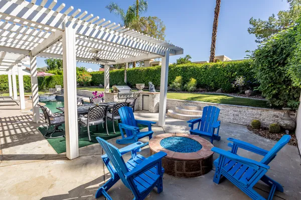 a view of a swimming pool with a patio