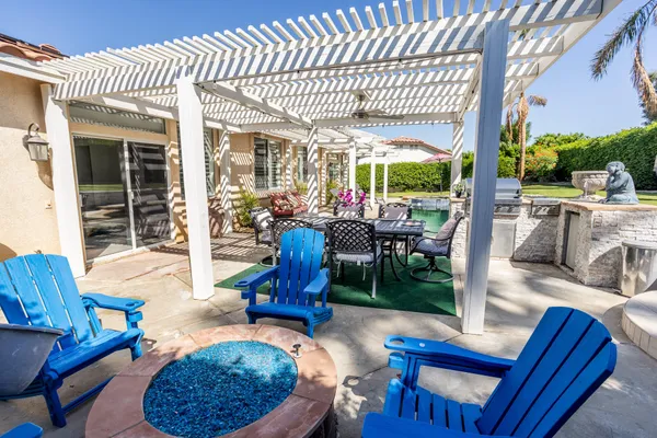 a view of a swimming pool with a patio