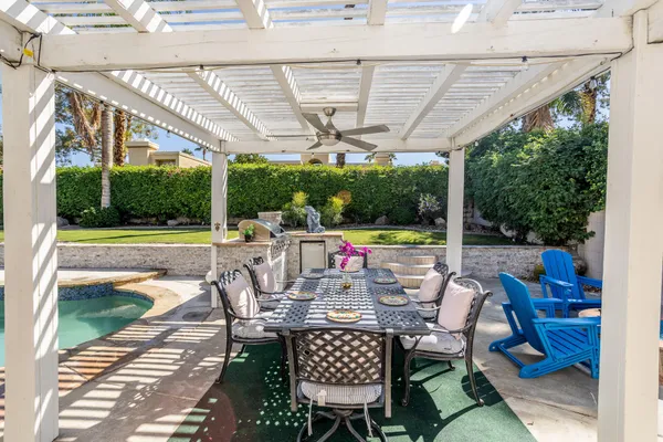 a view of a house with backyard porch and patio
